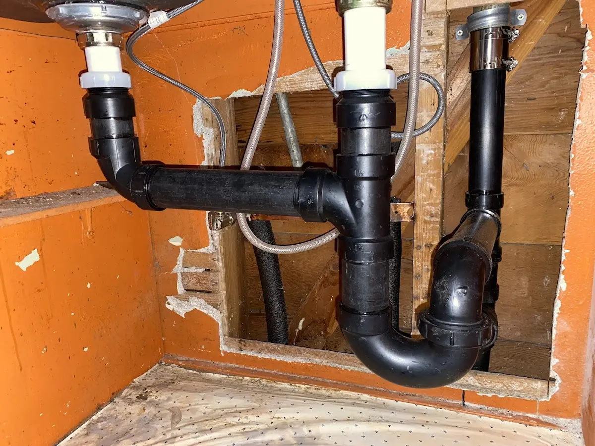 Professional Garbage Disposal Repair equipment and tools on the job in Vashon